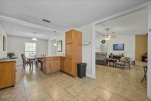 Dining room, Fireplace, Interior, Kitchen, Living room, Pendant Lights
