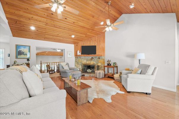 Dining room, Fireplace, Interior, Living room, Recessed Lighting, Wooden Ceilings, Wood Texture Flooring