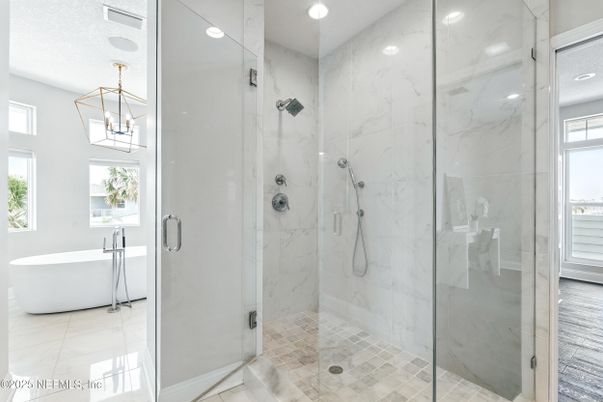 Bathroom, Free Standing Baths, Glass Shower, Interior, Marble Walls, Pendant Lights, Recessed Lighting