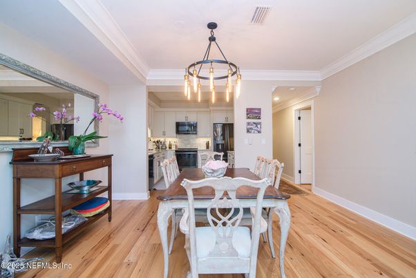 Dining room, Interior, Kitchen, Pendant Lights, Recessed Lighting, Stainless Steel Appliances, Wood Texture Flooring