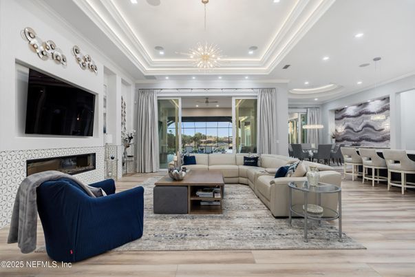 Dining room, Fireplace, Interior, Living room, Pendant Lights, Recessed Lighting, Wood Texture Flooring
