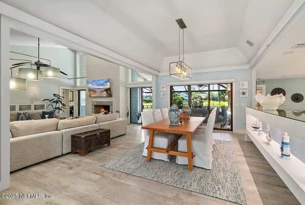 Dining room, Fireplace, Interior, Living room, Pendant Lights, Recessed Lighting, Wood Texture Flooring