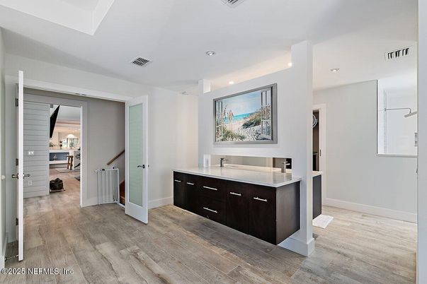 Bathroom, Dual Sink Vanities, Interior, Recessed Lighting, Wood Texture Flooring