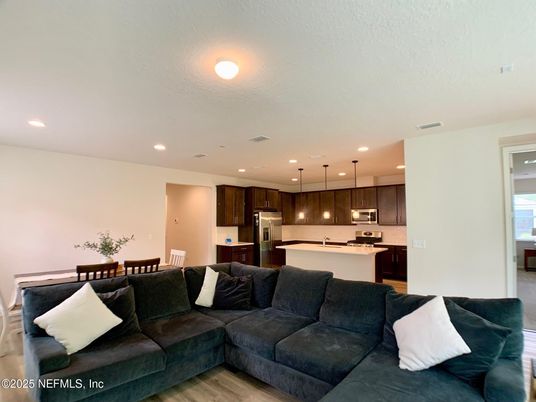 Dining room, Interior, Kitchen, Living room, Pendant Lights, Recessed Lighting, Stainless Steel Appliances, Wood Texture Flooring