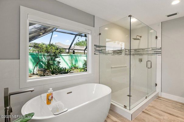 Bathroom, Free Standing Baths, Glass Shower, Interior, Recessed Lighting, Wood Texture Flooring