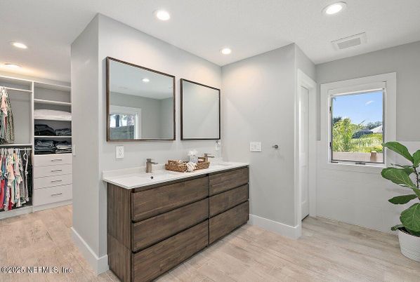Bathroom, Dual Sink Vanities, Interior, Recessed Lighting, Walk-in Closets, Wood Texture Flooring