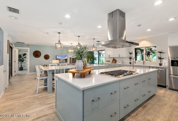 Dining room, Interior, Kitchen, Pendant Lights, Recessed Lighting, Stainless Steel Appliances, Wood Texture Flooring