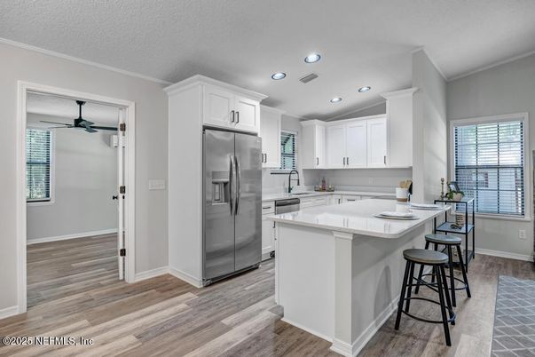 Interior, Kitchen, Recessed Lighting, Stainless Steel Appliances, Wood Texture Flooring