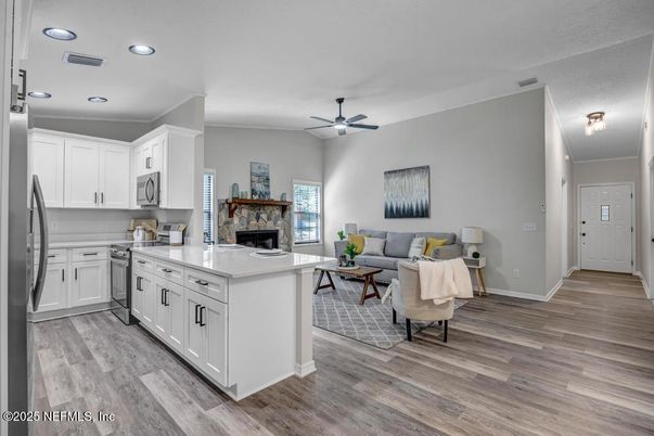 Fireplace, Interior, Kitchen, Living room, Recessed Lighting, Wood Texture Flooring