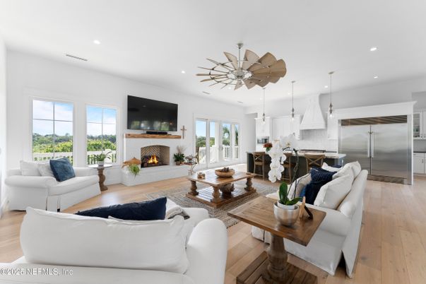 Fireplace, Interior, Kitchen, Living room, Pendant Lights, Recessed Lighting, Stainless Steel Appliances, Wood Texture Flooring