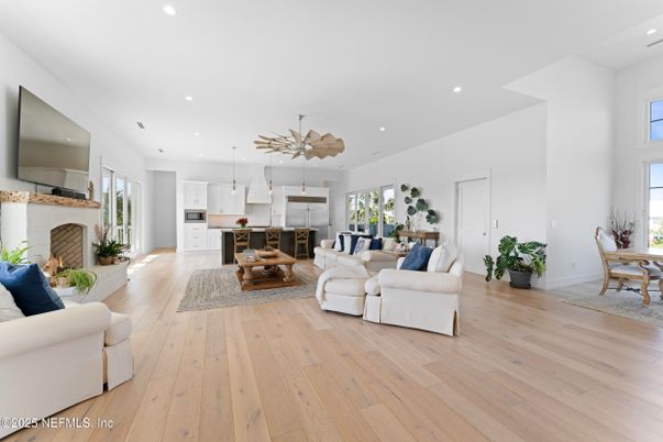 Dining room, Fireplace, Interior, Kitchen, Living room, Pendant Lights, Recessed Lighting, Stainless Steel Appliances, Wood Texture Flooring