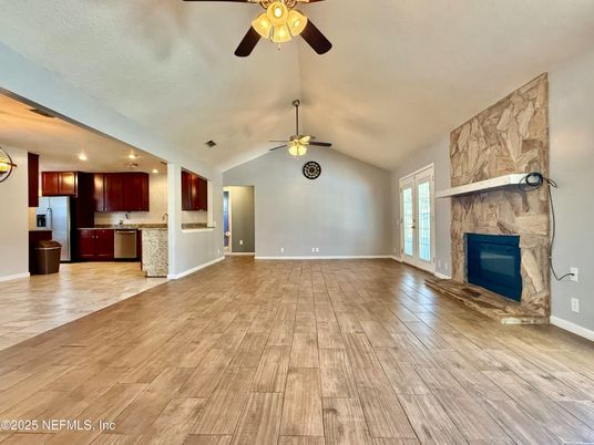 Empty room, Fireplace, Interior, Kitchen, Recessed Lighting, Wood Texture Flooring