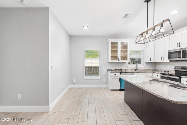 Interior, Kitchen, Pendant Lights, Recessed Lighting, Stainless Steel Appliances, Wood Texture Flooring