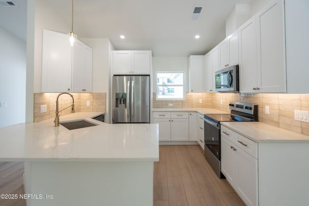 Interior, Kitchen, Pendant Lights, Recessed Lighting, Stainless Steel Appliances, Wood Texture Flooring