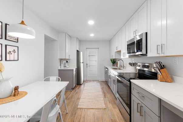 Interior, Kitchen, Pendant Lights, Recessed Lighting, Stainless Steel Appliances, Wood Texture Flooring