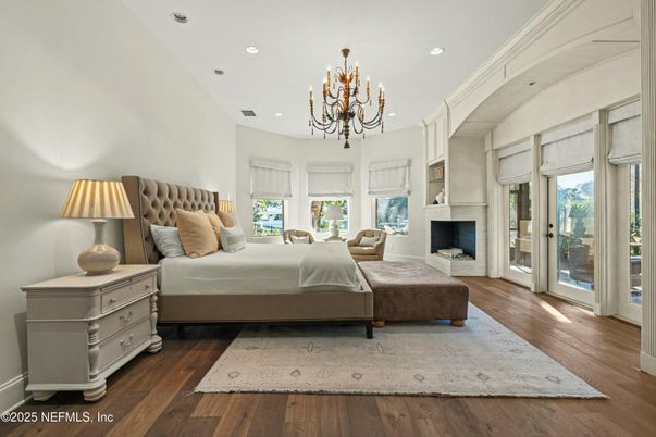 Bedroom, Chandelier, Fireplace, Interior, Recessed Lighting, Wood Texture Flooring