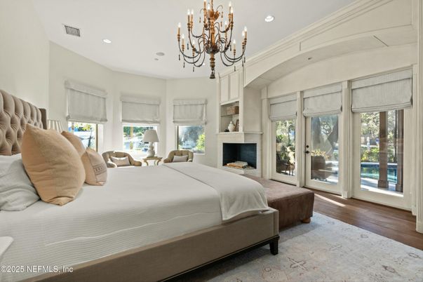 Bedroom, Chandelier, Fireplace, Interior, Recessed Lighting, Wood Texture Flooring