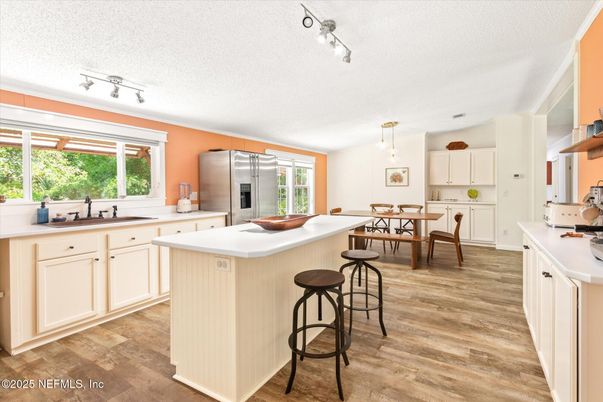 Dining room, Interior, Kitchen, Pendant Lights, Stainless Steel Appliances, Wood Texture Flooring