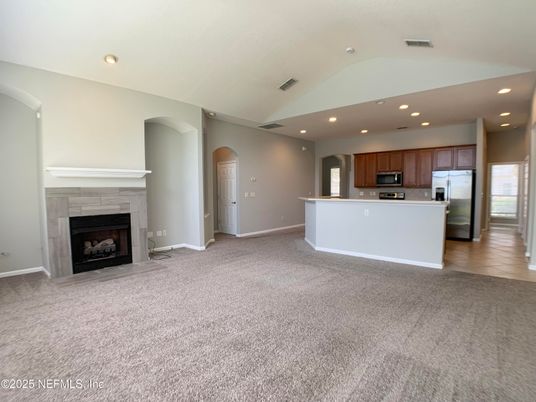 Empty room, Fireplace, Interior, Kitchen, Recessed Lighting, Stainless Steel Appliances