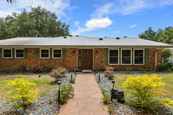 Exterior, Facade, Brick Facade, Log Home