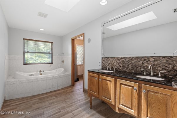 Bathroom, Dual Sink Vanities, Interior, Recessed Lighting, Wood Texture Flooring