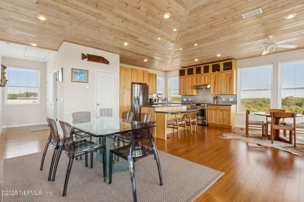 Dining room, Interior, Kitchen, Recessed Lighting, Stainless Steel Appliances, Wooden Ceilings, Wood Texture Flooring