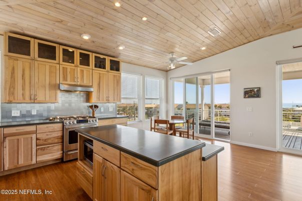 Dining room, Interior, Kitchen, Recessed Lighting, Stainless Steel Appliances, Wooden Ceilings, Wood Texture Flooring
