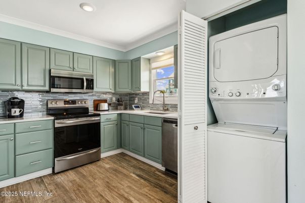 Interior, Kitchen, Recessed Lighting, Stainless Steel Appliances, Utility Closets, Washer, Wood Texture Flooring