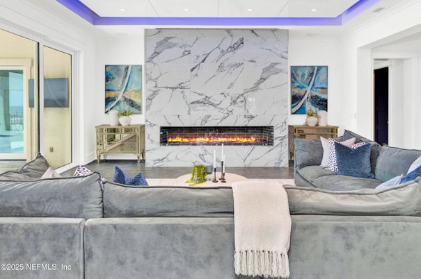 Fireplace, Interior, Living room, Marble Walls, Recessed Lighting, Wood Texture Flooring