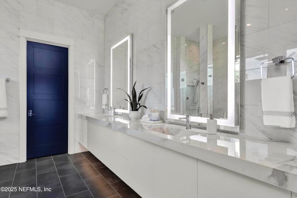 Bathroom, Dual Sink Vanities, Glass Shower, Interior, Marble Walls, Recessed Lighting