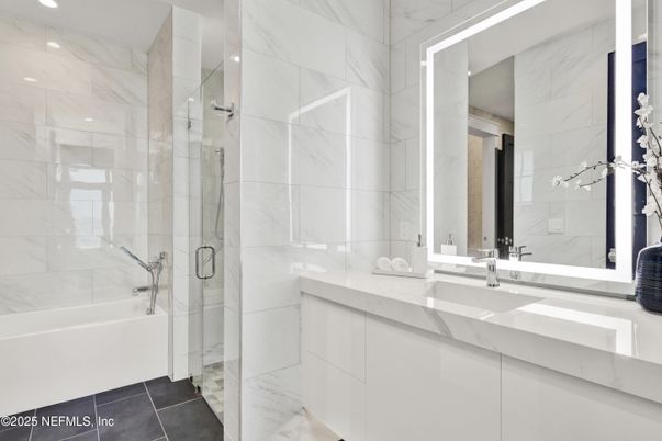 Bathroom, Dual Sink Vanities, Glass Shower, Interior, Marble Walls, Recessed Lighting
