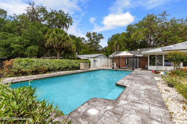 Exterior, Pool, Solar Panels