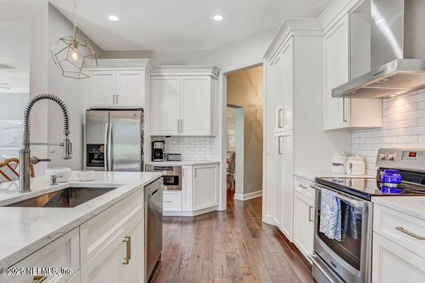 Interior, Kitchen, Pendant Lights, Recessed Lighting, Stainless Steel Appliances, Wood Texture Flooring