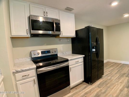 Interior, Kitchen, Recessed Lighting, Stainless Steel Appliances, Wood Texture Flooring