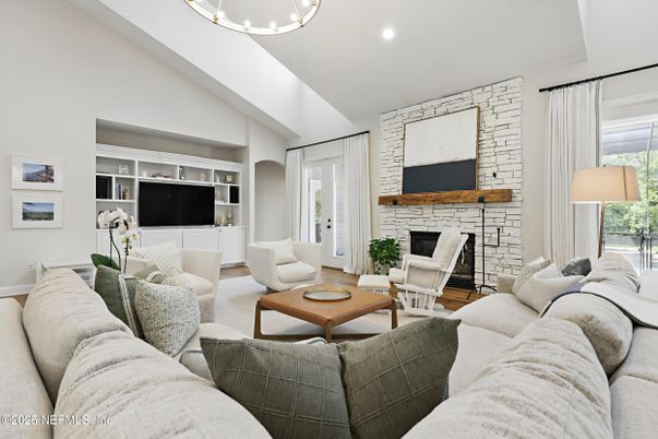 Fireplace, Interior, Living room, Recessed Lighting, Stone Walls, Wood Texture Flooring
