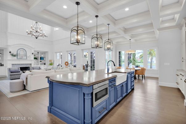 Chandelier, Dining room, Fireplace, Interior, Kitchen, Living room, Pendant Lights, Recessed Lighting, Wood Texture Flooring