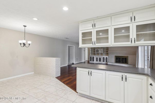 Chandelier, Fireplace, Interior, Kitchen, Pendant Lights, Recessed Lighting, Wood Texture Flooring