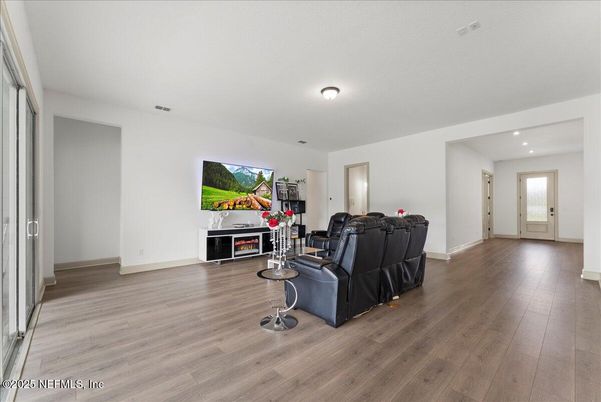 Fireplace, Interior, Living room, Recessed Lighting, Wood Texture Flooring