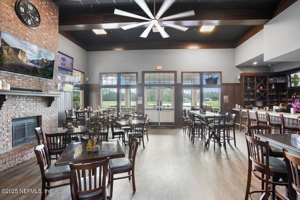 Dining room, Fireplace, Interior, Recessed Lighting, Stone Walls, Wooden Beams, Wood Texture Flooring