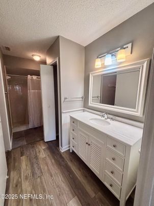 Bathroom, Dual Sink Vanities, Glass Shower, Interior, Wood Texture Flooring