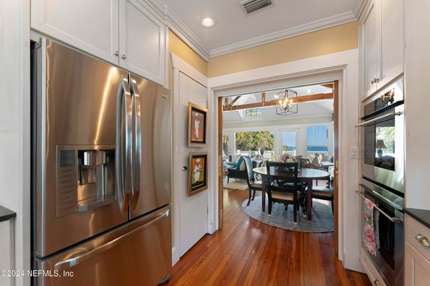 Chandelier, Dining room, Interior, Kitchen, Recessed Lighting, Stainless Steel Appliances, Wood Texture Flooring