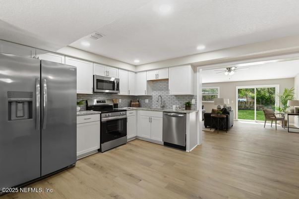 Interior, Kitchen, Recessed Lighting, Stainless Steel Appliances, Wood Texture Flooring