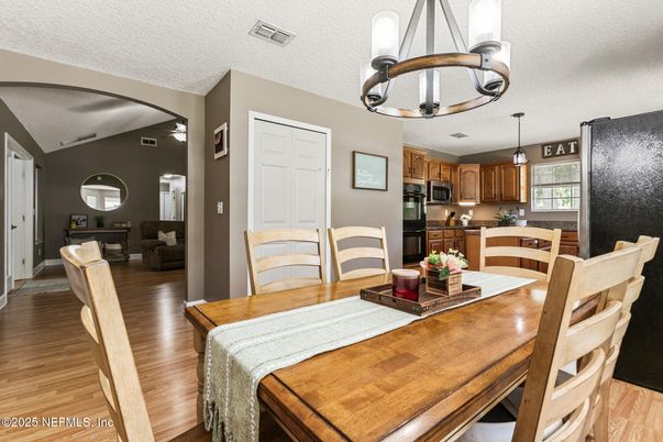Dining room, Interior, Kitchen, Pendant Lights, Stainless Steel Appliances, Wood Texture Flooring