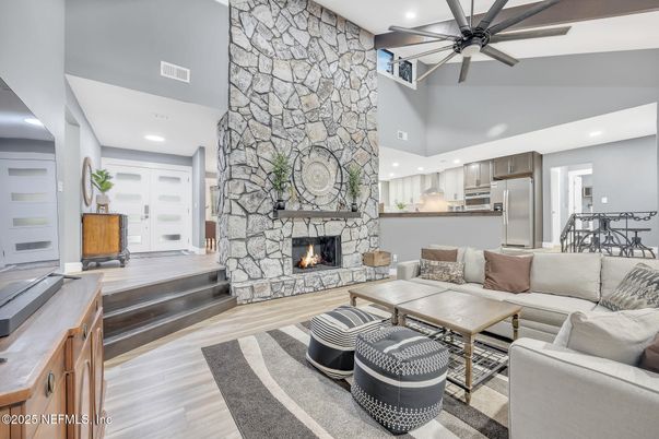 Fireplace, Interior, Kitchen, Living room, Recessed Lighting, Stainless Steel Appliances, Stone Walls, Wood Texture Flooring