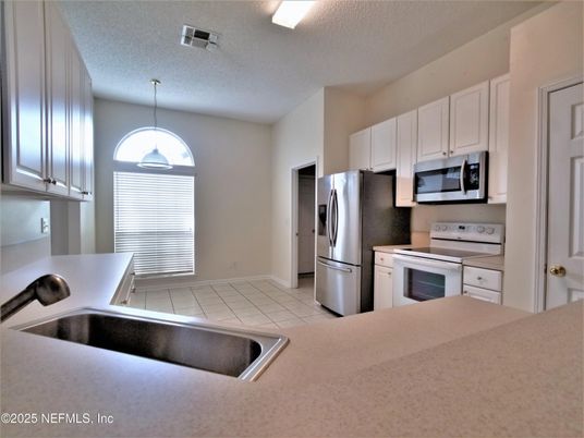 Interior, Kitchen, Pendant Lights, Tile Countertops