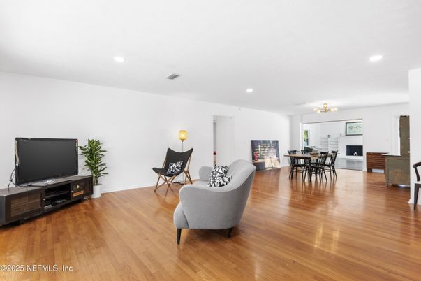 Chandelier, Dining room, Fireplace, Interior, Living room, Recessed Lighting, Wood Texture Flooring