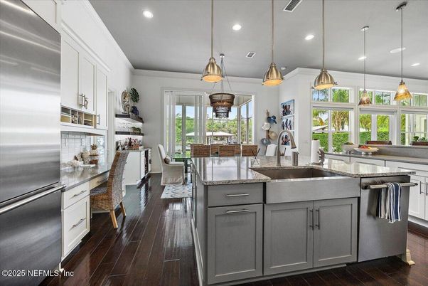 Dining room, Interior, Kitchen, Pendant Lights, Recessed Lighting, Stainless Steel Appliances, Wood Texture Flooring