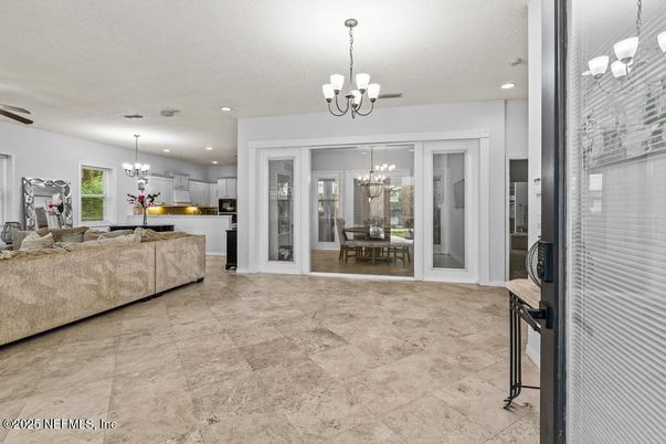 Chandelier, Dining room, Interior, Kitchen, Living room, Pendant Lights, Recessed Lighting, Stainless Steel Appliances