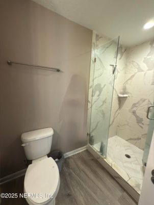Bathroom, Glass Shower, Interior, Marble Walls, Recessed Lighting, Wood Texture Flooring