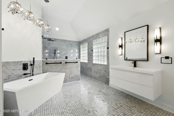Bathroom, Dual Sink Vanities, Free Standing Baths, Glass Shower, Interior, Marble Walls, Pendant Lights, Recessed Lighting